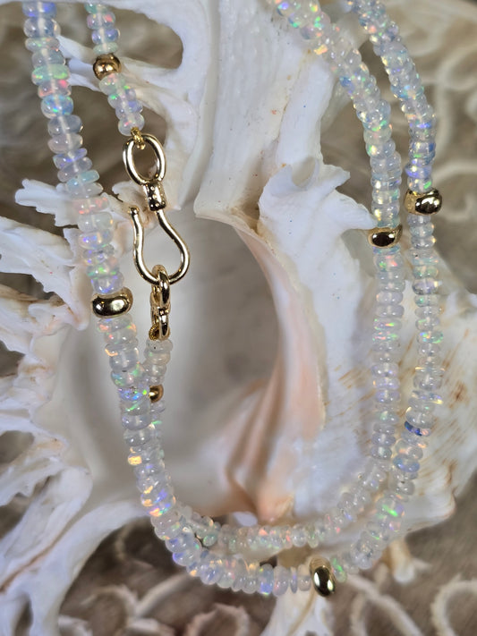 Shimmering Symphony: Ethiopian Opal Necklace with Gold Accents