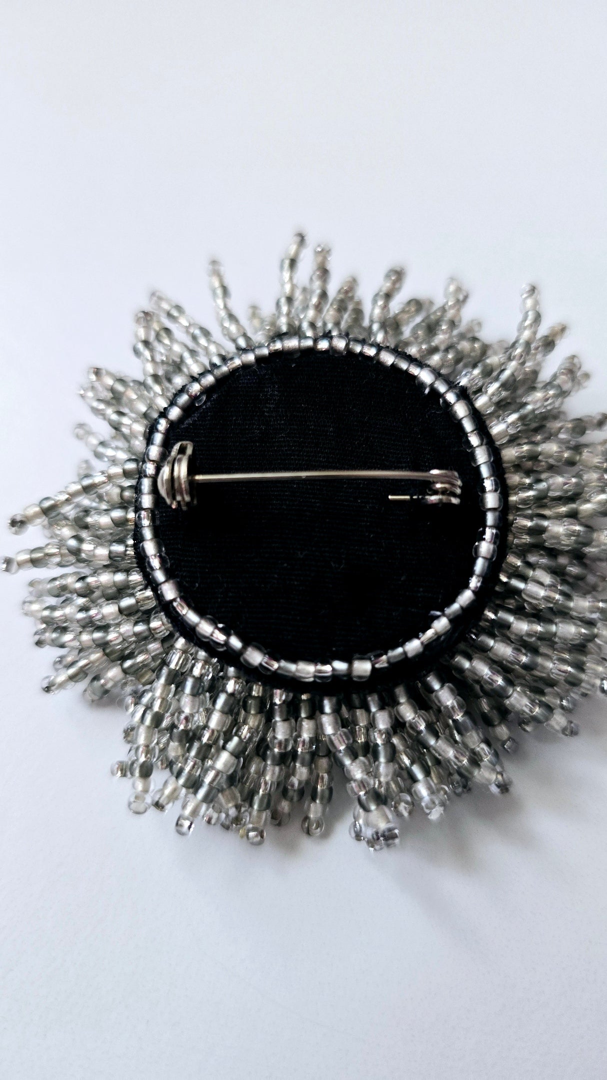 Crystal White Sunburst Brooch