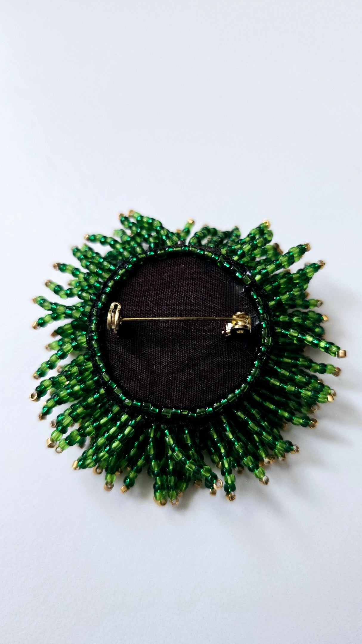 Green Sunburst Brooch