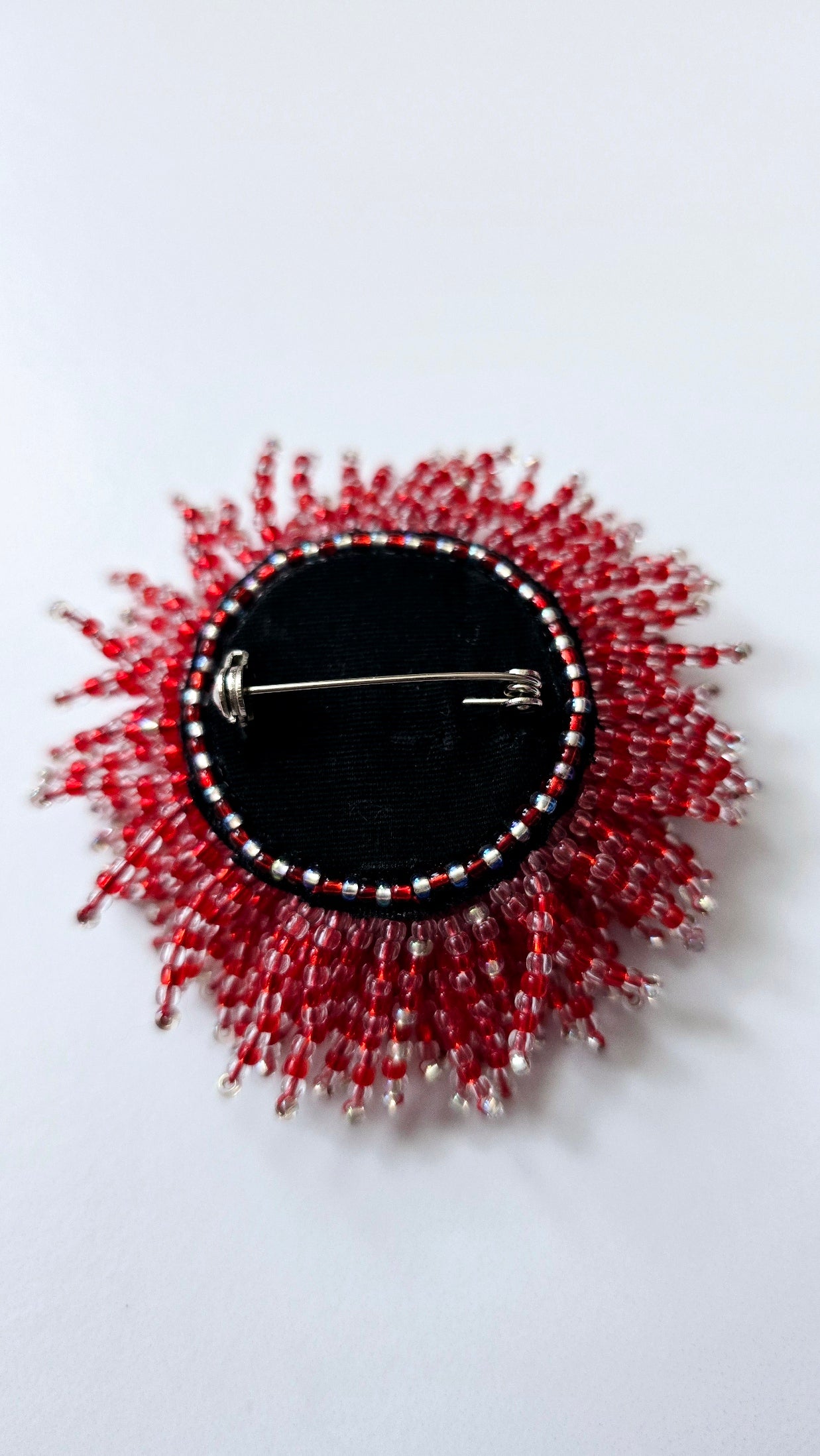 Red Sunburst Brooch